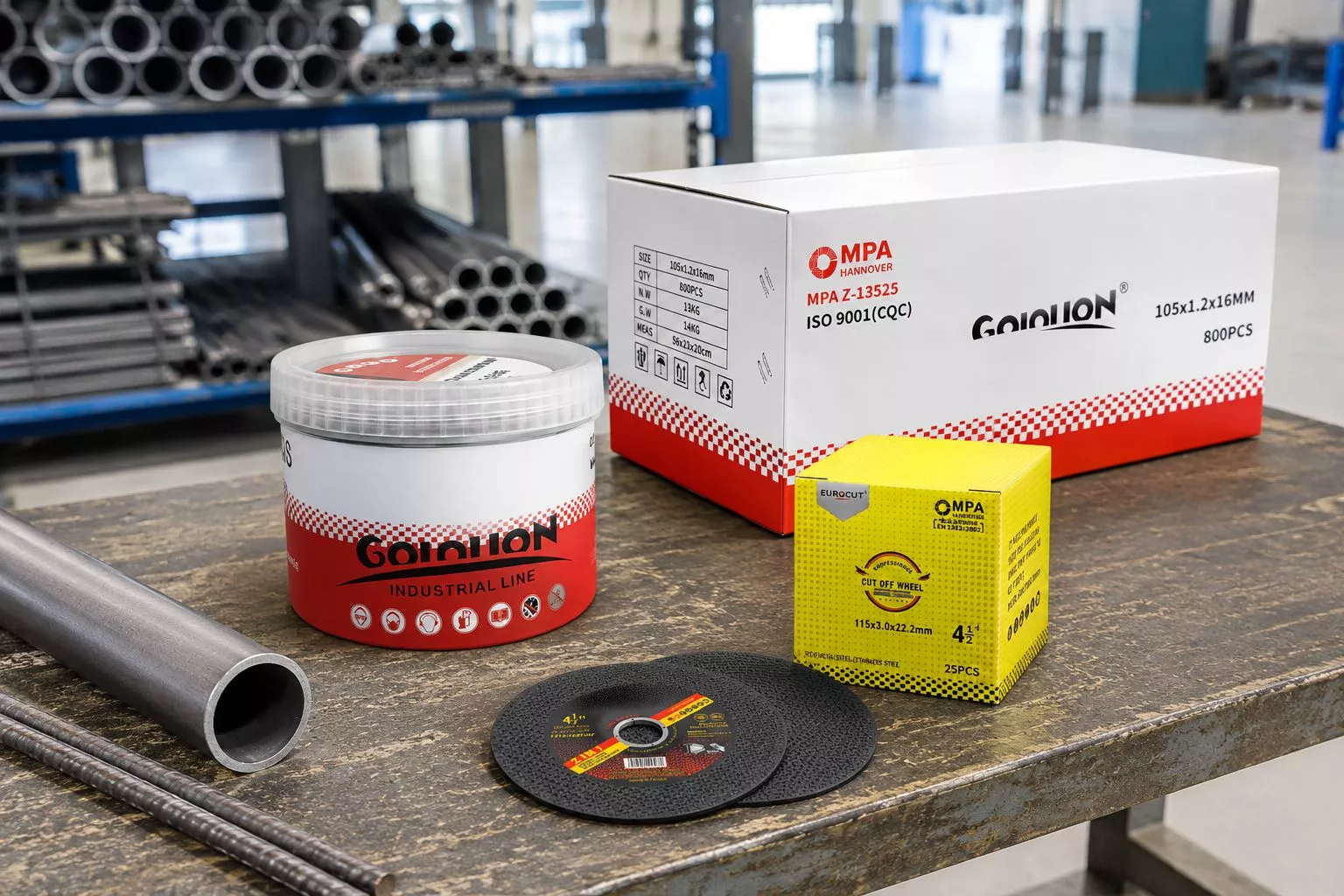 105mm ultra-thin cutting discs and wholesale carton placed on a metal fabrication bench with steel rebar, showing the extra cutting depth capacity for industrial processing